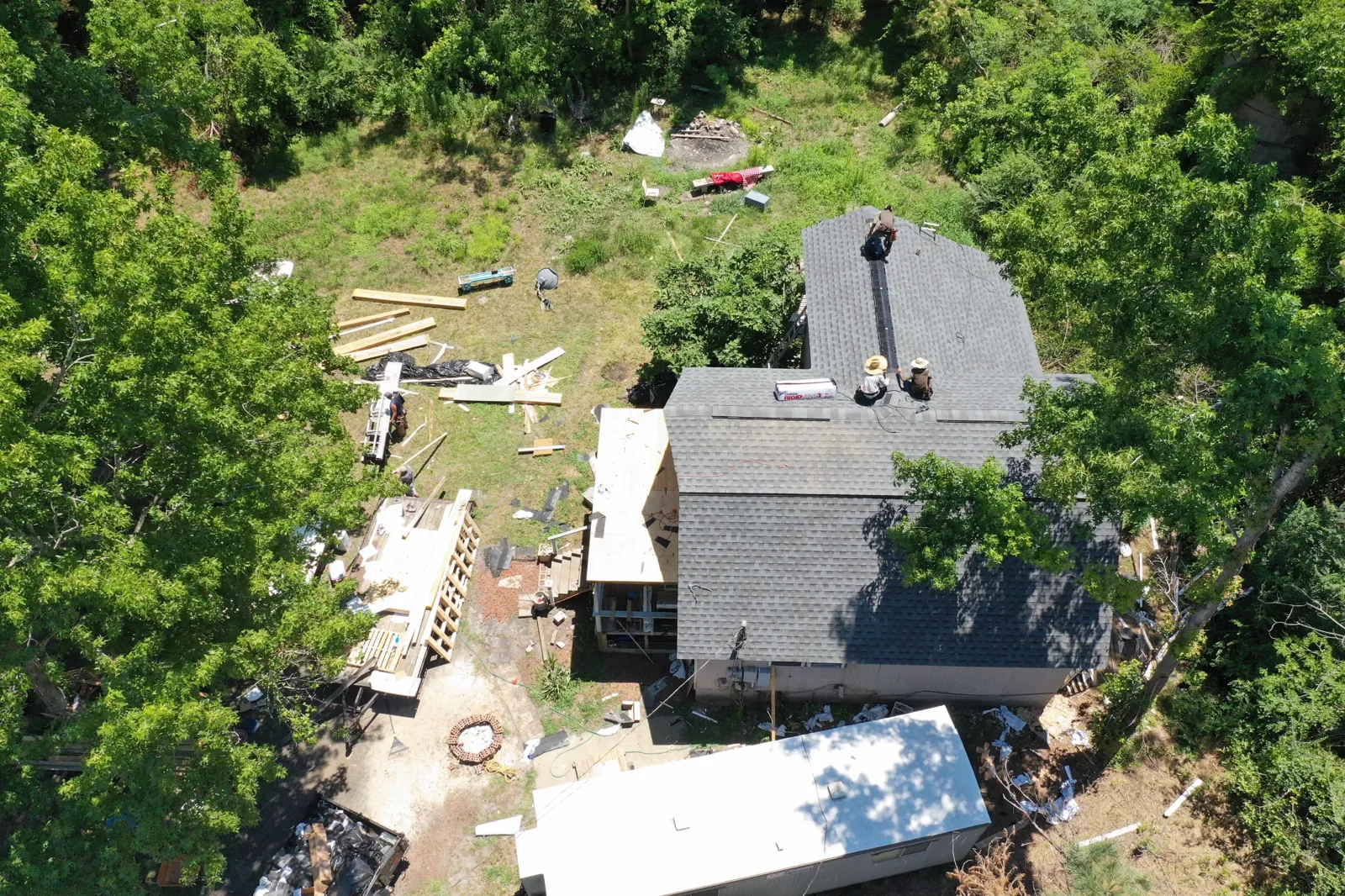 GAF certified Patriots' Roofing crew installing a roof
