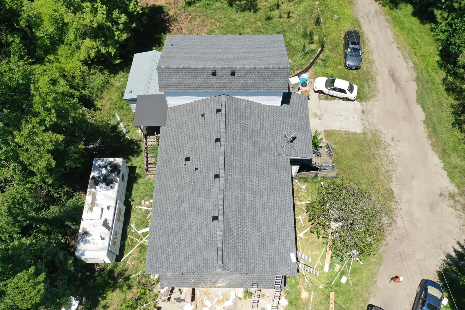 Completed architectural shingle roof replacement, aerial view