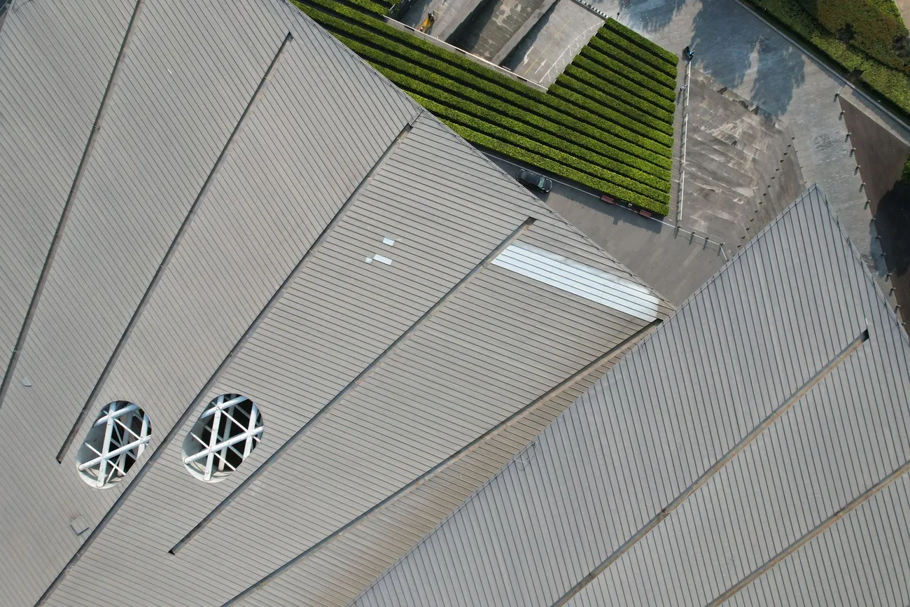 Standing-seam metal roof on a commercial building