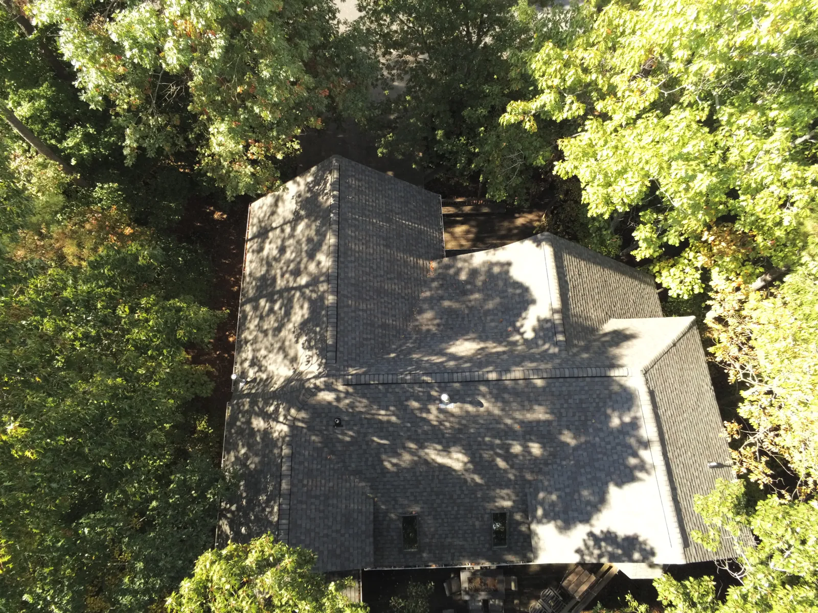 Finished roof on a home serviced by Patriots Roofing