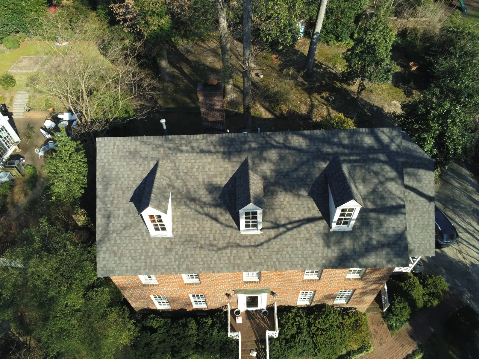 Finished roof restored after storm damage by Patriots Roofing