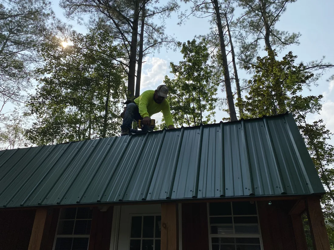 Concealed-fastener standing seam metal roof with clean vertical seams and no exposed screws