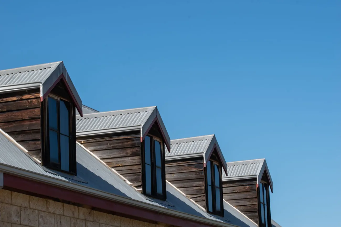 Clean standing seam metal roof on a coastal home