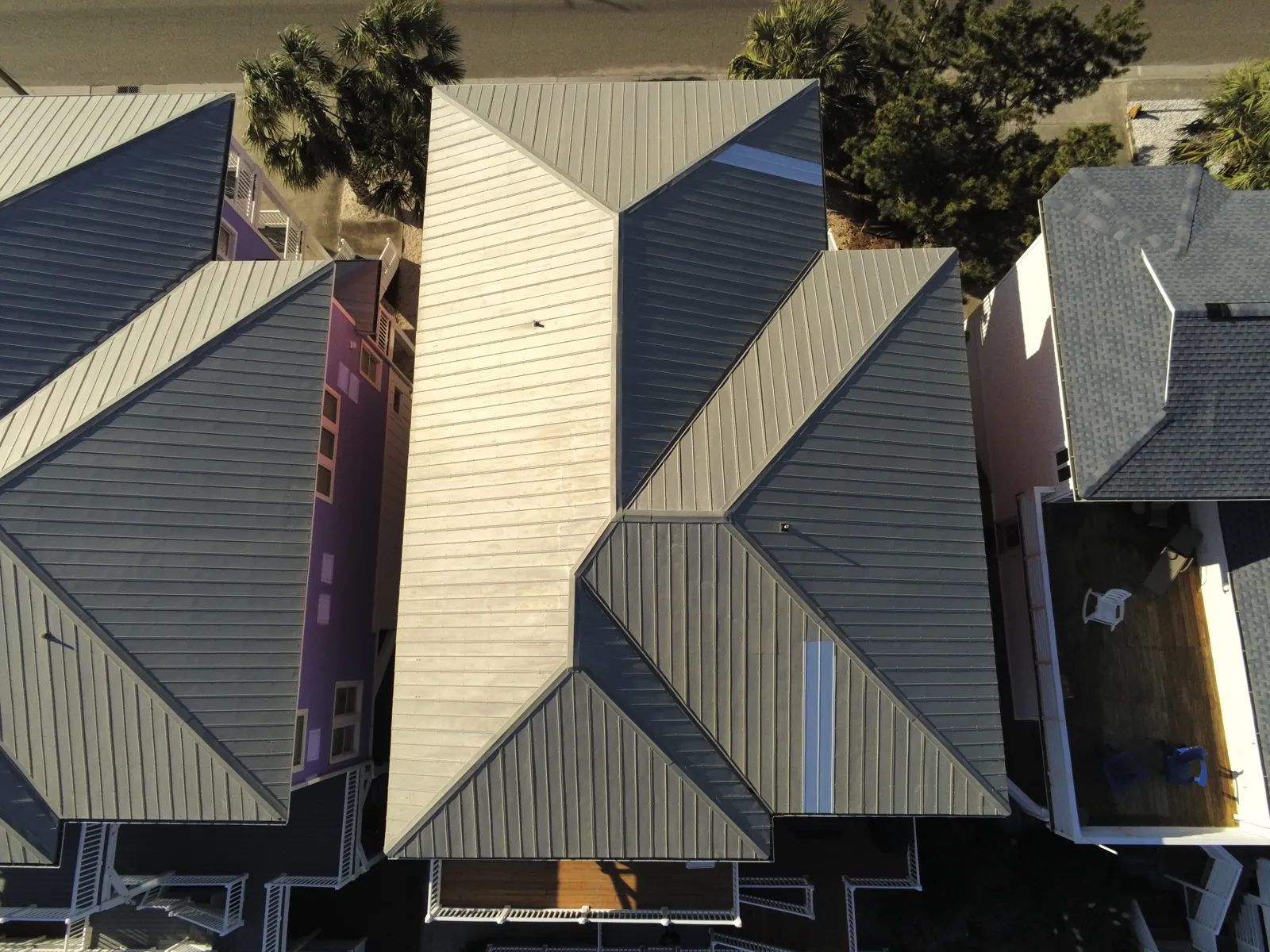 Standing-seam metal roof ridge and panel detail
