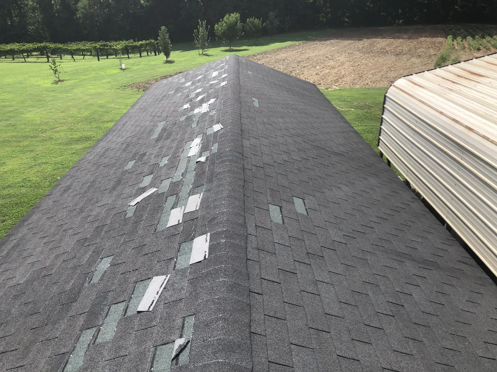 Storm and hail damage on a Plainview, Texas roof